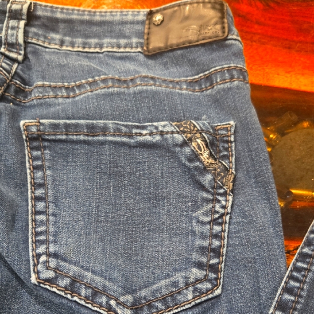 Silver Women's Jeans Blue Denim with Subtle Fading and Whiskering